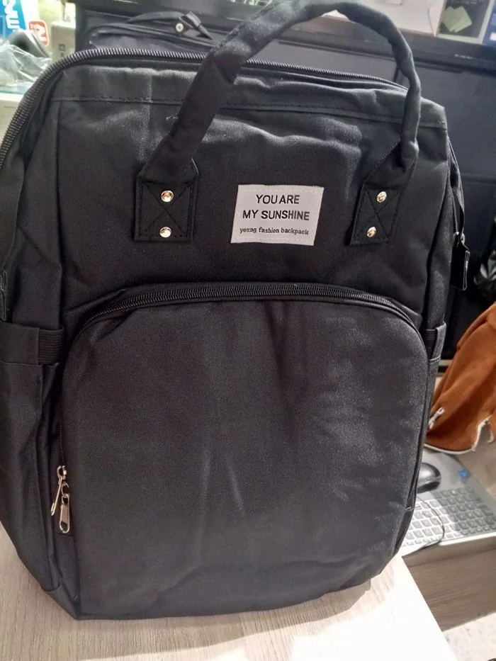 Pañalera con cambiador y cuna plegable tipo morral — foto 5